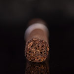 Crux Epicure Maduro Toro cigar foot